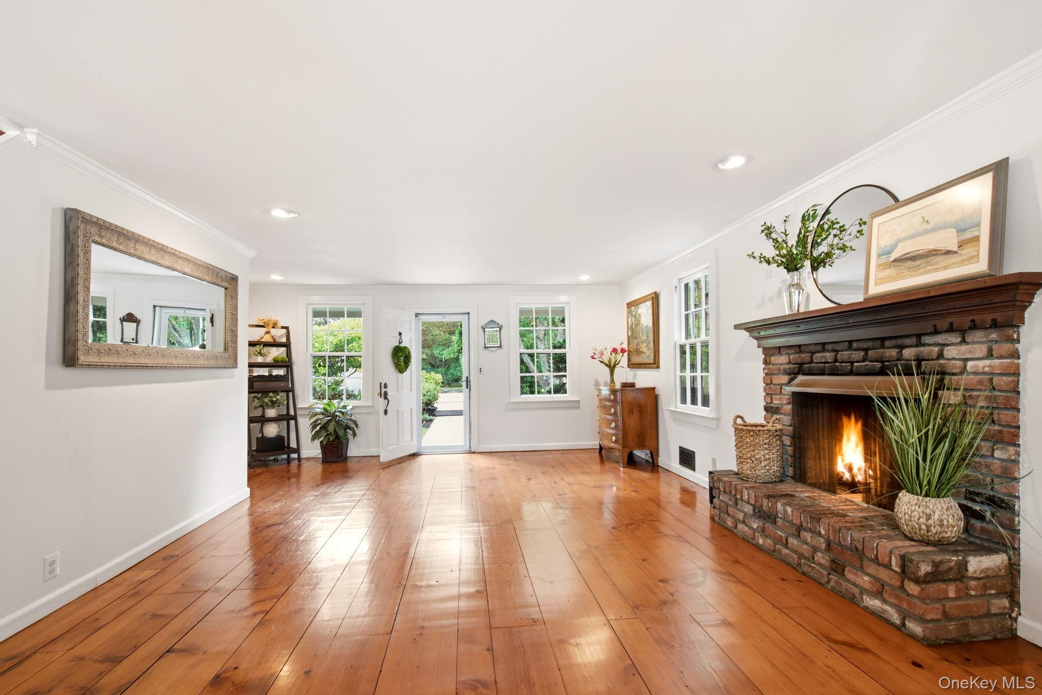 33 Prospect Road Centerport, NY 11721 - Photo 5 of 48 100 year old heart pine floors in living room.