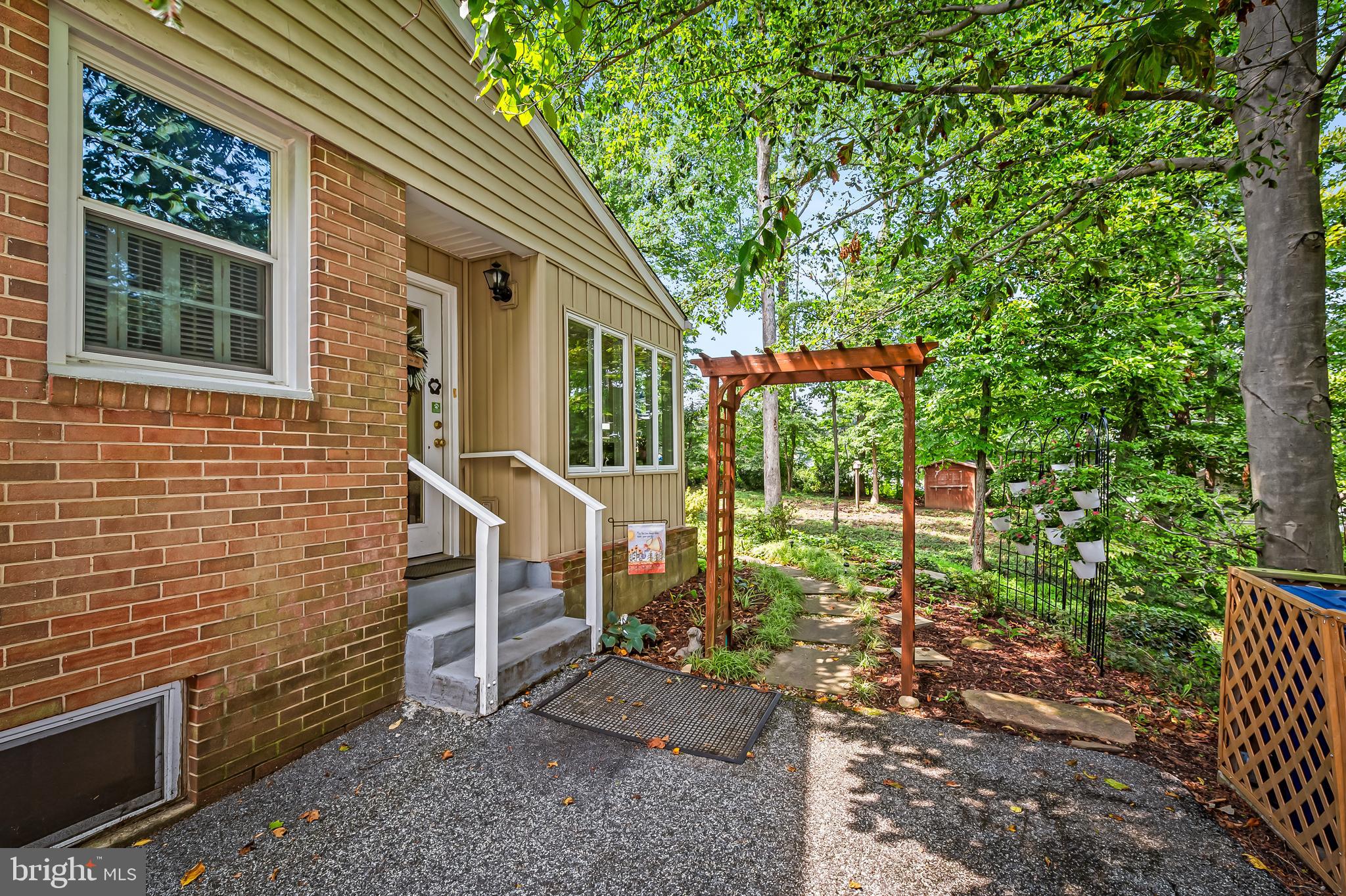 206 Charmuth Road Lutherville-Timonium, MD 21093 - Photo 24 of 45 Driveway entry to sunroom