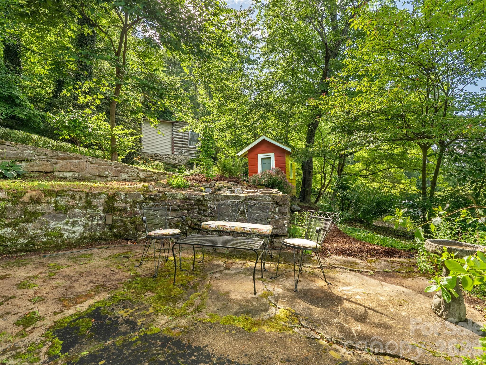 206 Chestnut Hill Road Gerton, NC 28735 - Photo 40 of 48 a view of a chairs and table in the patio