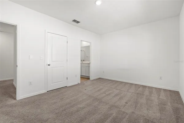 an empty room with an entryway