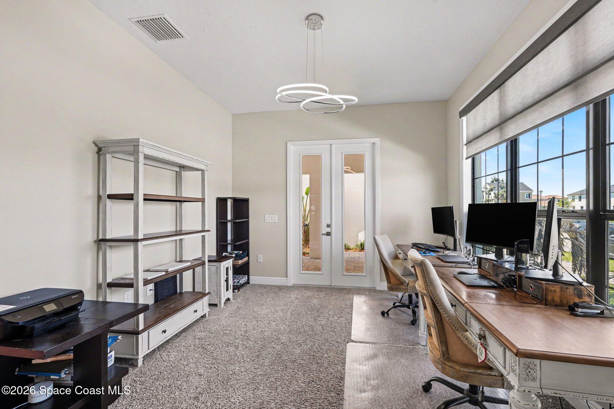 2467 Kola Way Melbourne, FL 32940 - Photo 13 of 36 Office with French doors onto courtyard