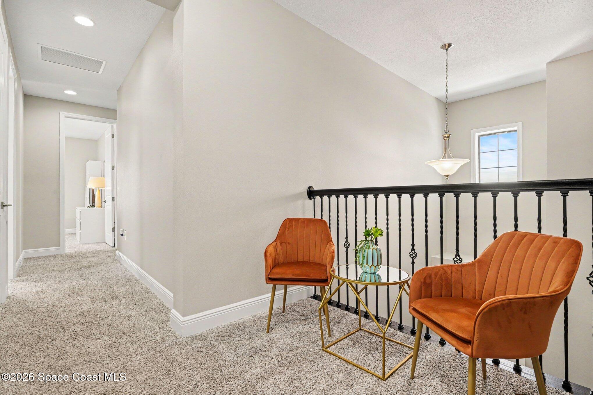 2467 Kola Way Melbourne, FL 32940 - Photo 26 of 36 Upstairs landing flex space