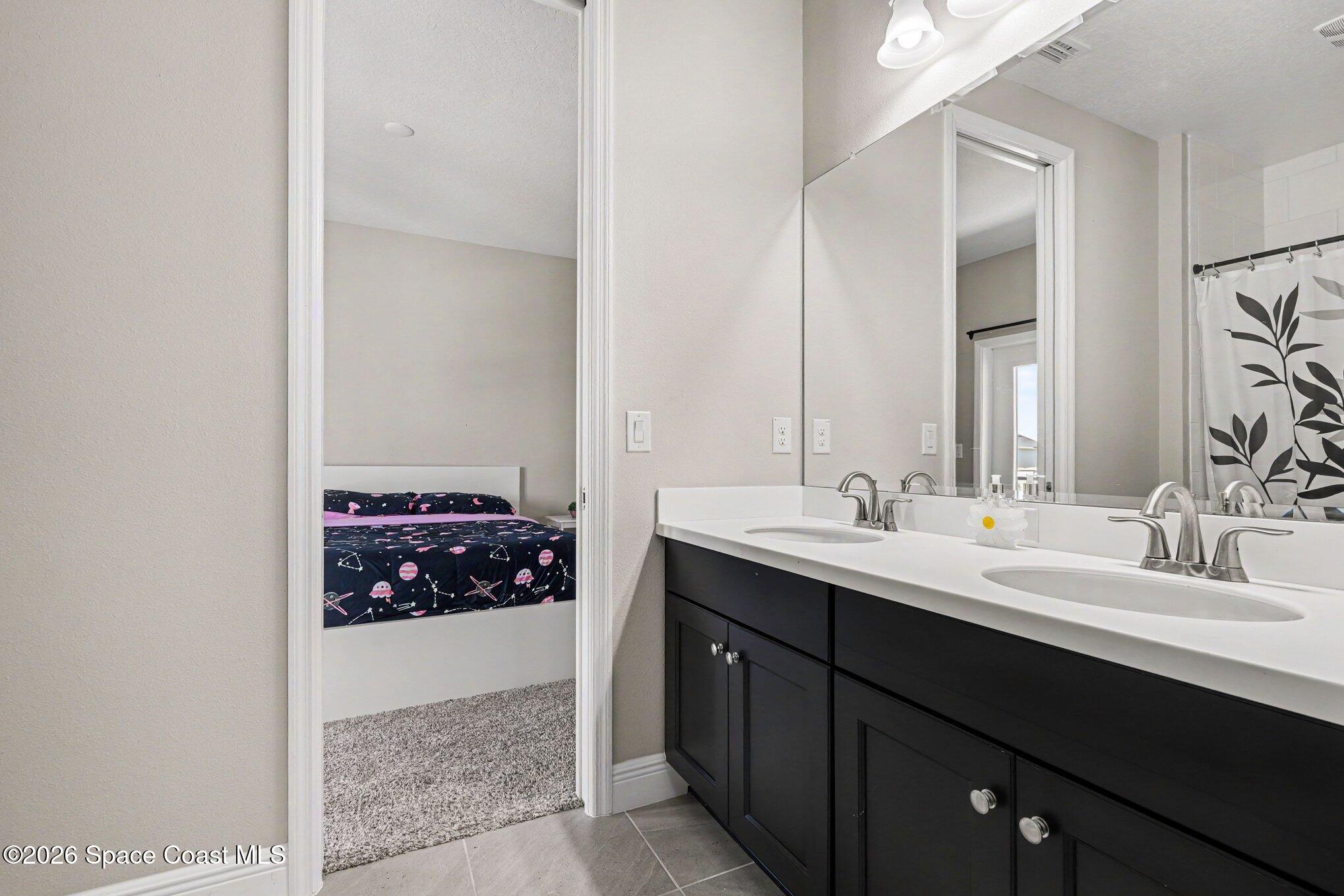2467 Kola Way Melbourne, FL 32940 - Photo 30 of 36 Jack and Jill bathroom 3
