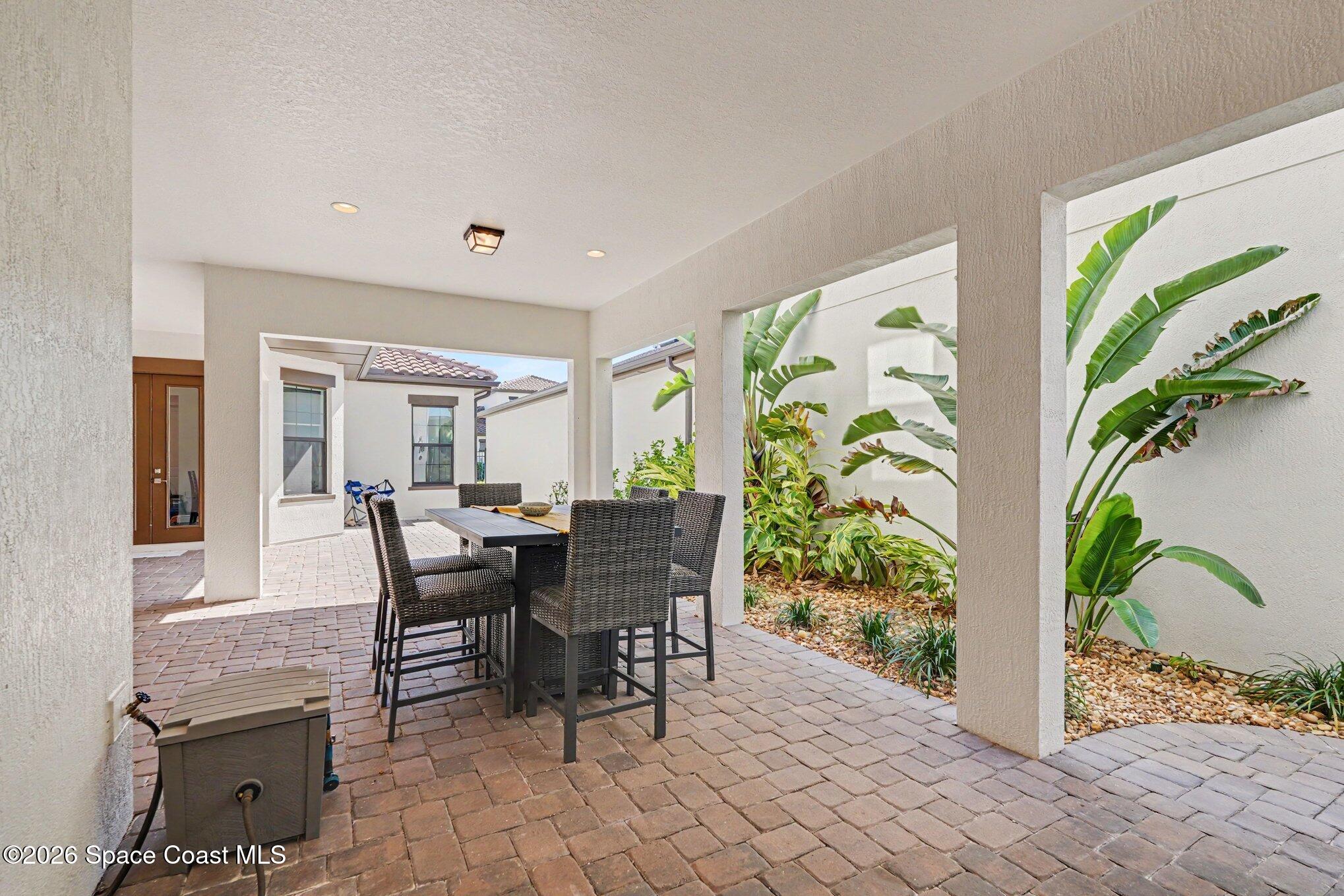 2467 Kola Way Melbourne, FL 32940 - Photo 5 of 36 Courtyard plumbed for outdoor kitchen