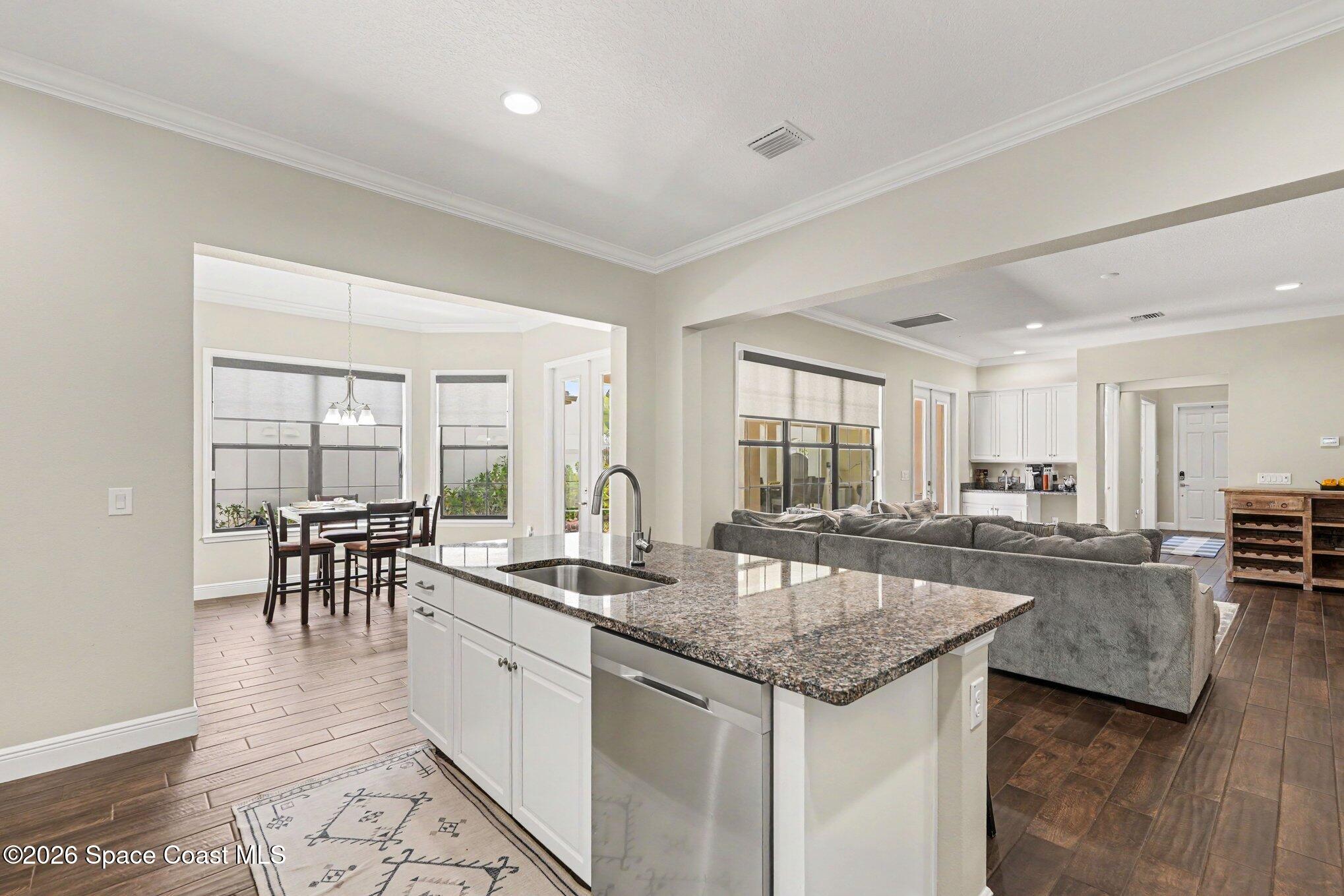 2467 Kola Way Melbourne, FL 32940 - Photo 6 of 36 Open kitchen with eat in dining area.