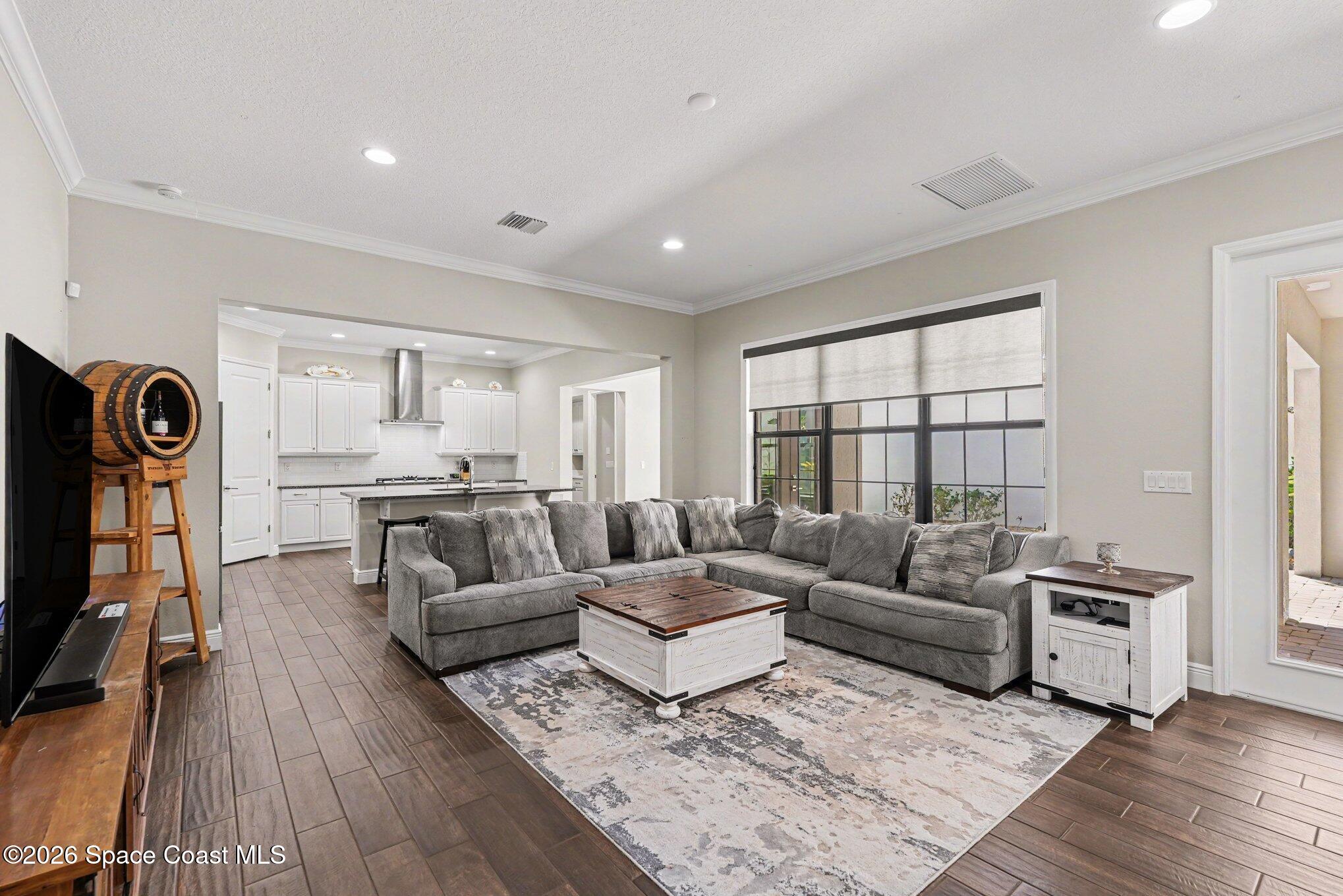 2467 Kola Way Melbourne, FL 32940 - Photo 7 of 36 Family Room with Courtyard View