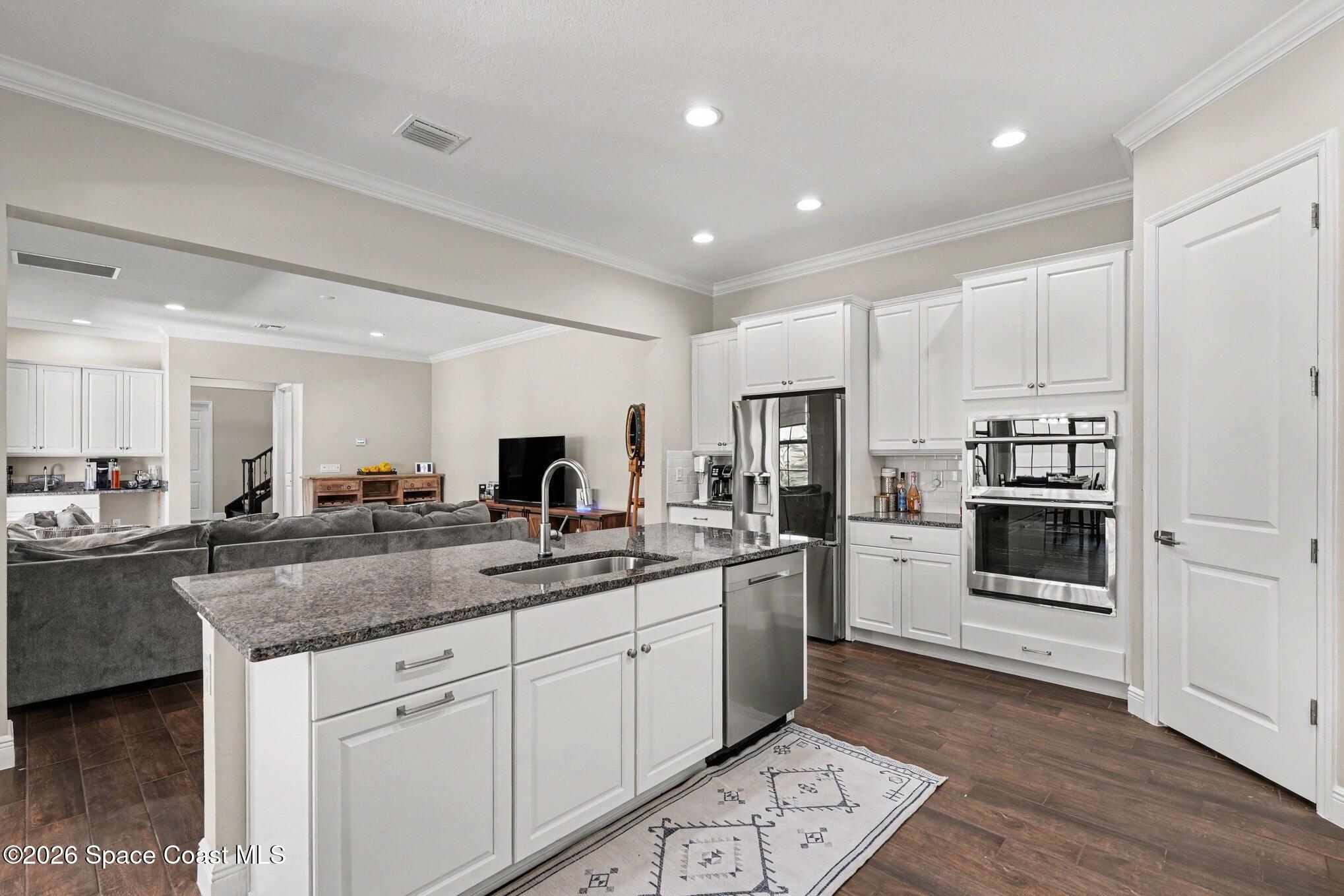 2467 Kola Way Melbourne, FL 32940 - Photo 10 of 36 Kitchen with extra cabinets