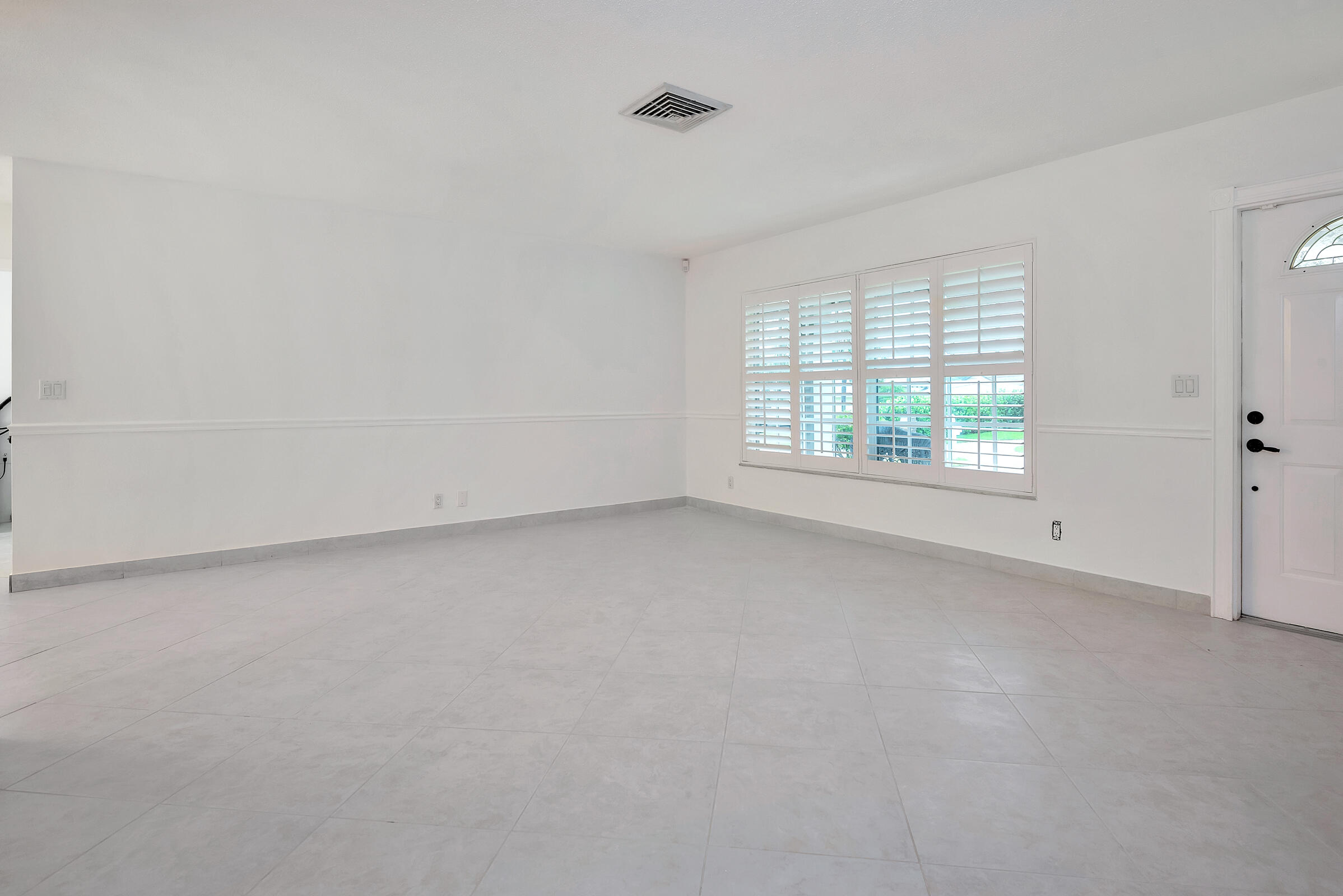 474 Northwest 11th Street Boca Raton, FL 33432 - Photo 33 of 61 an empty room with a window