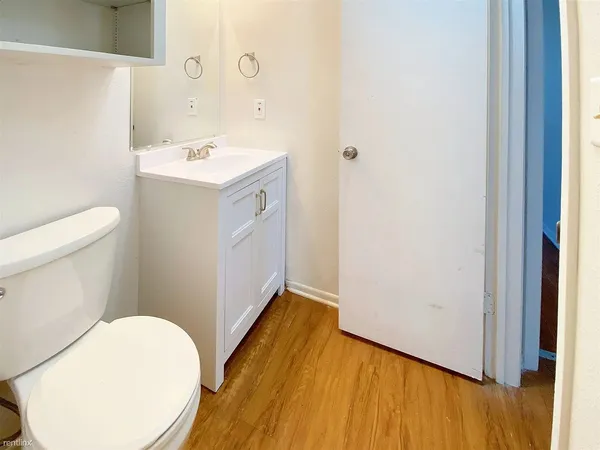 a bathroom with a sink and a toilet