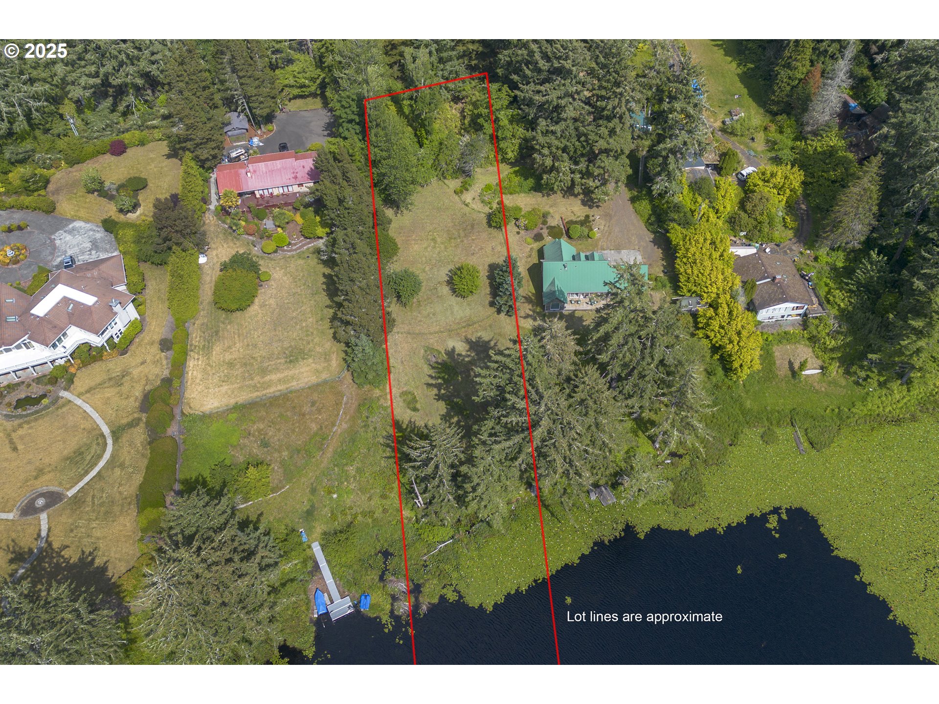 a aerial view of residential house with an outdoor space