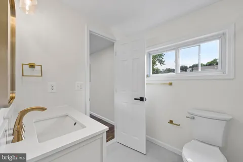 a bathroom with a sink and a toilet