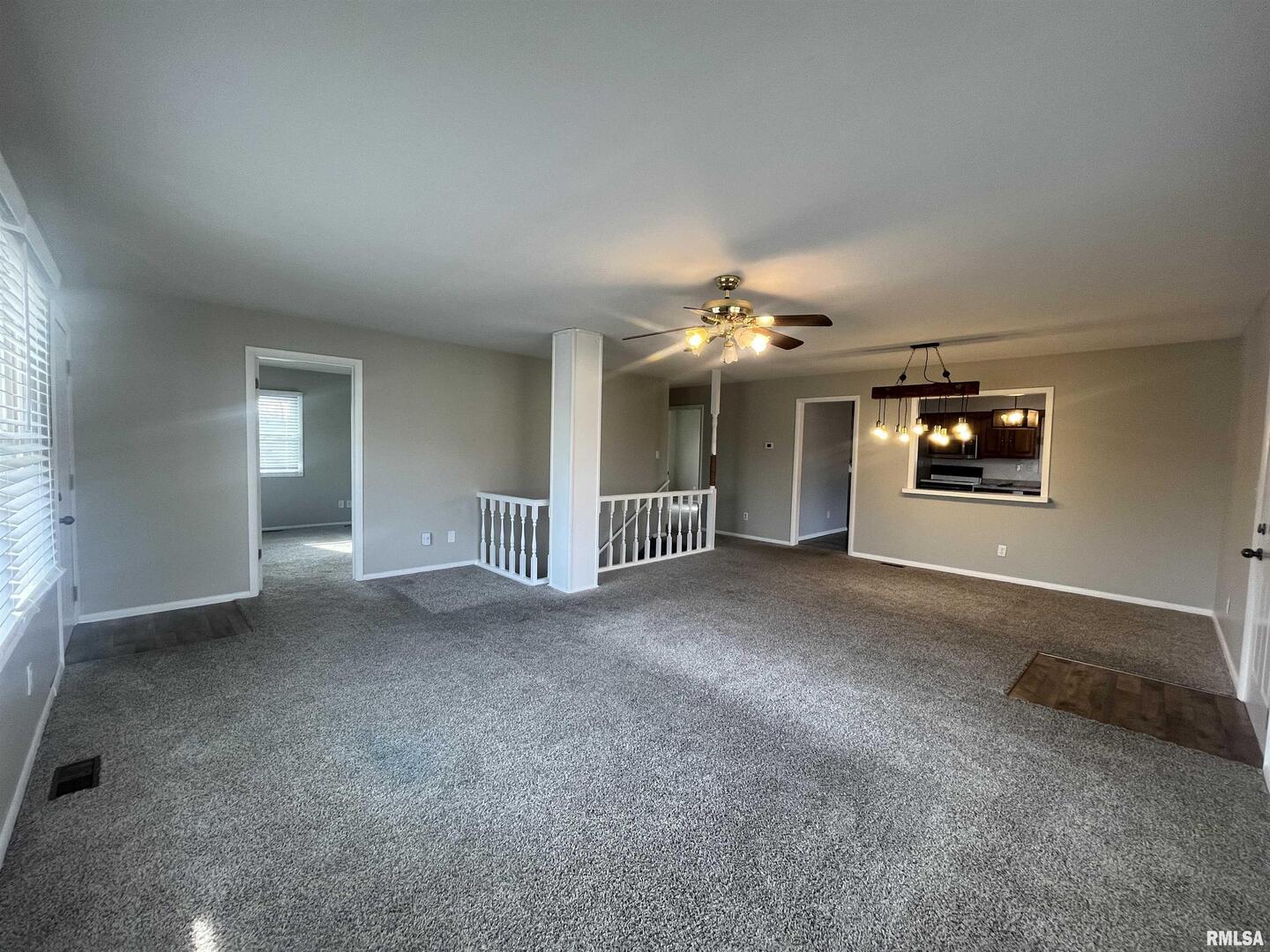 314 East 8th Street Metropolis, IL 62960 - Photo 9 of 33 a view of a livingroom with furniture and chandelier