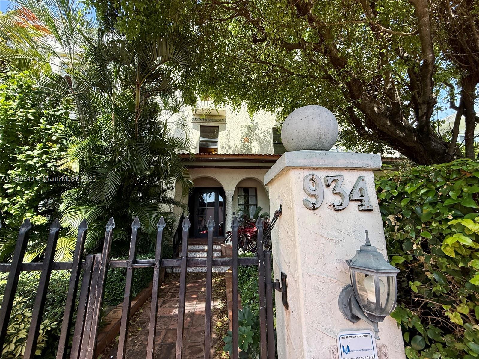 934 Michigan Avenue, Unit 304 Miami Beach, FL 33139 - Photo 1 of 30 a front view of a house with garden