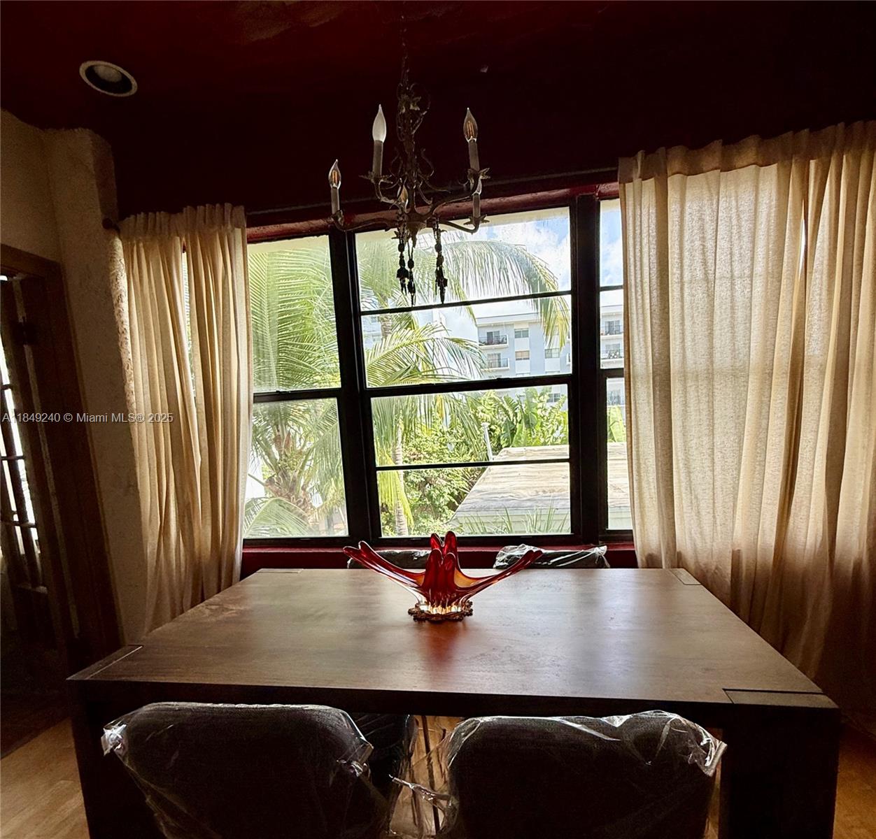 934 Michigan Avenue, Unit 304 Miami Beach, FL 33139 - Photo 21 of 30 a view of a workspace with a window