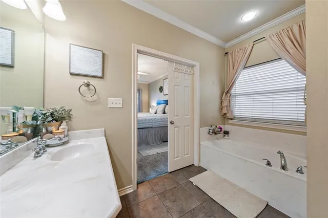 a bathroom with a sink and a bathtub