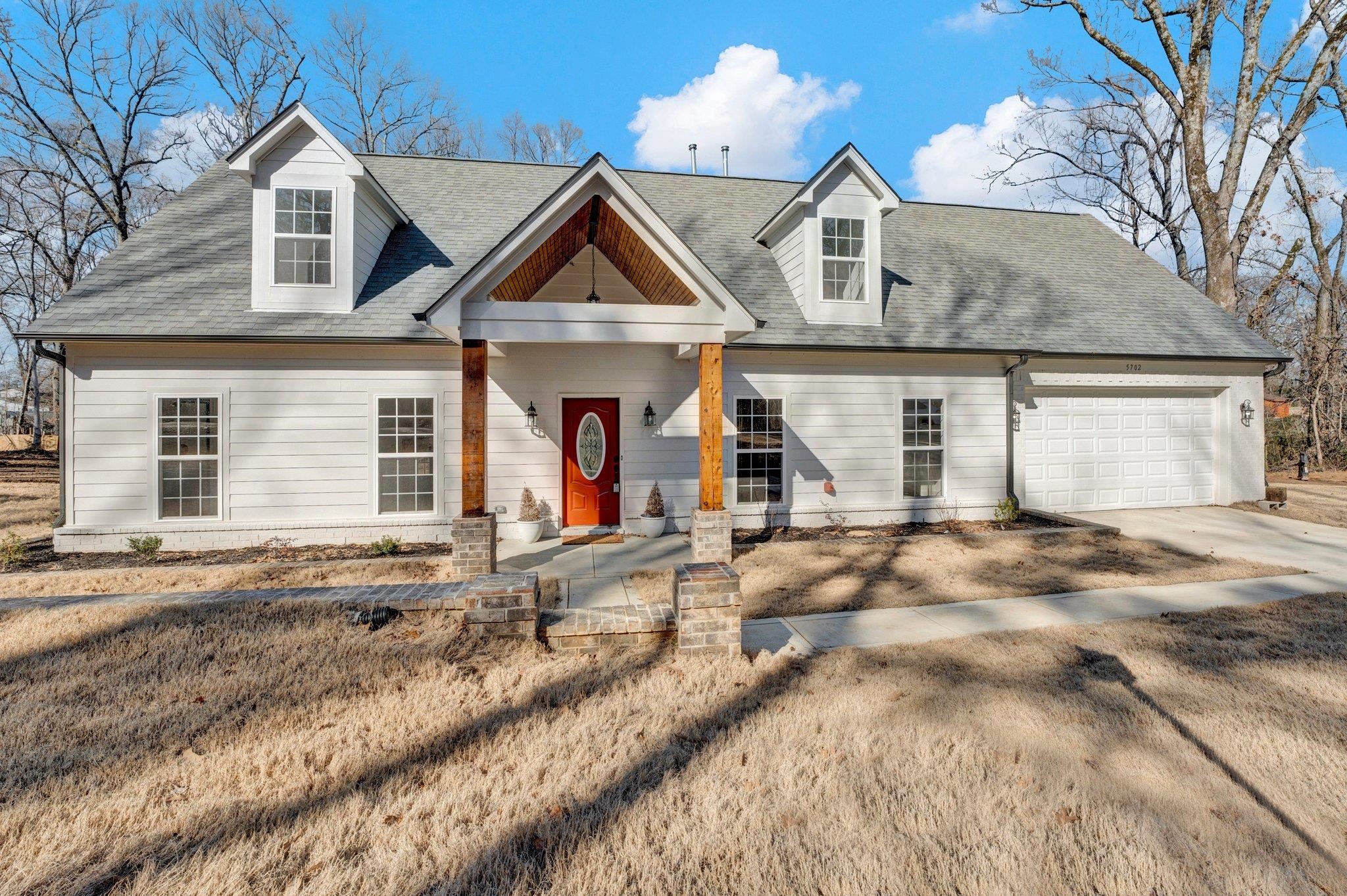 5702 Spring Lake Road Memphis, TN 38135 - Photo 1 of 38 front view of a house with a yard