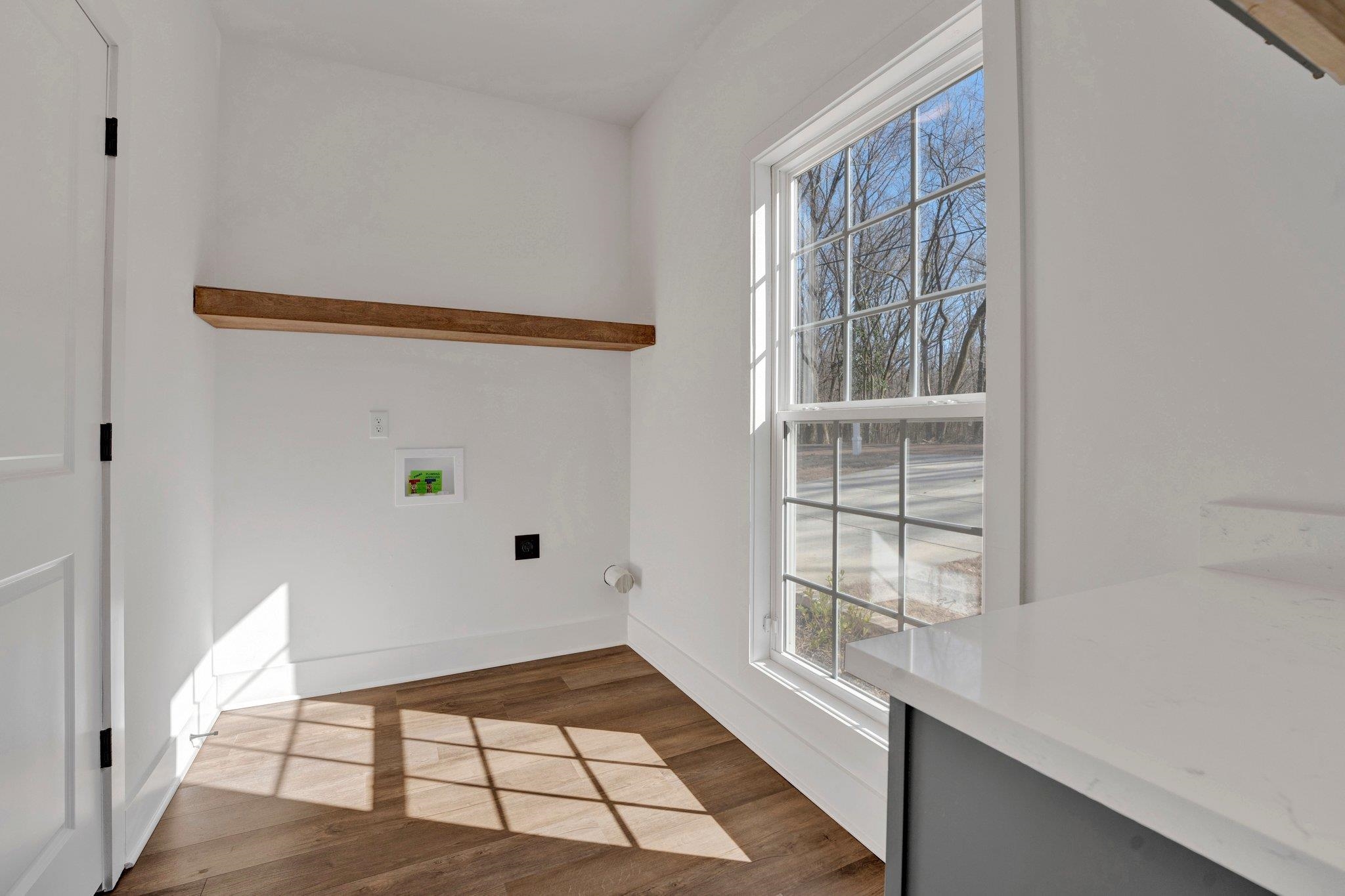 5702 Spring Lake Road Memphis, TN 38135 - Photo 15 of 38 a view of an empty room with a window