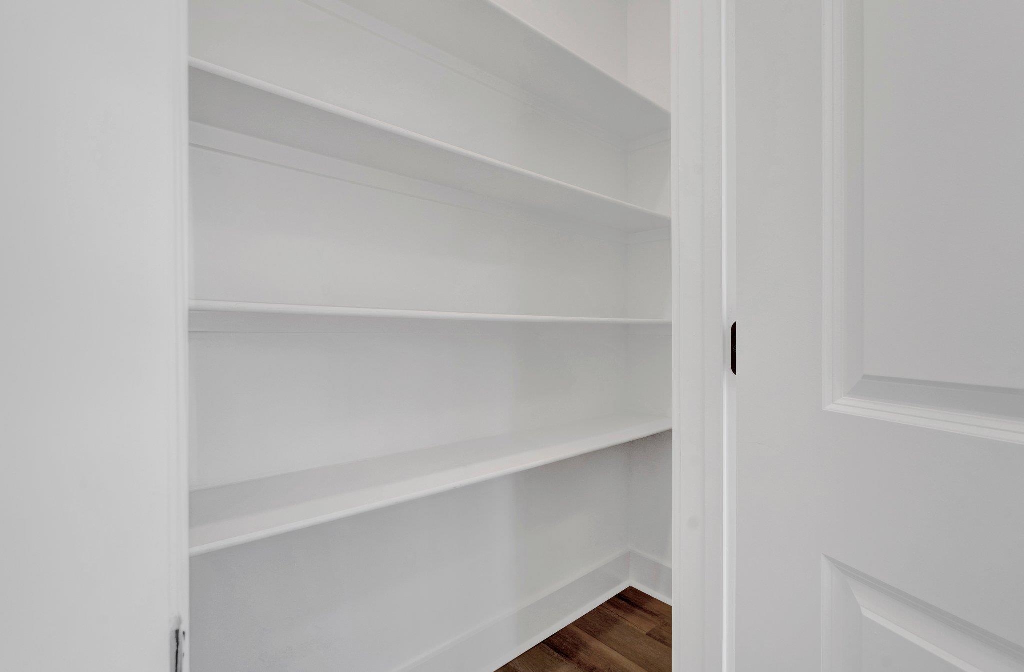 5702 Spring Lake Road Memphis, TN 38135 - Photo 16 of 38 a view of an empty walk in closet