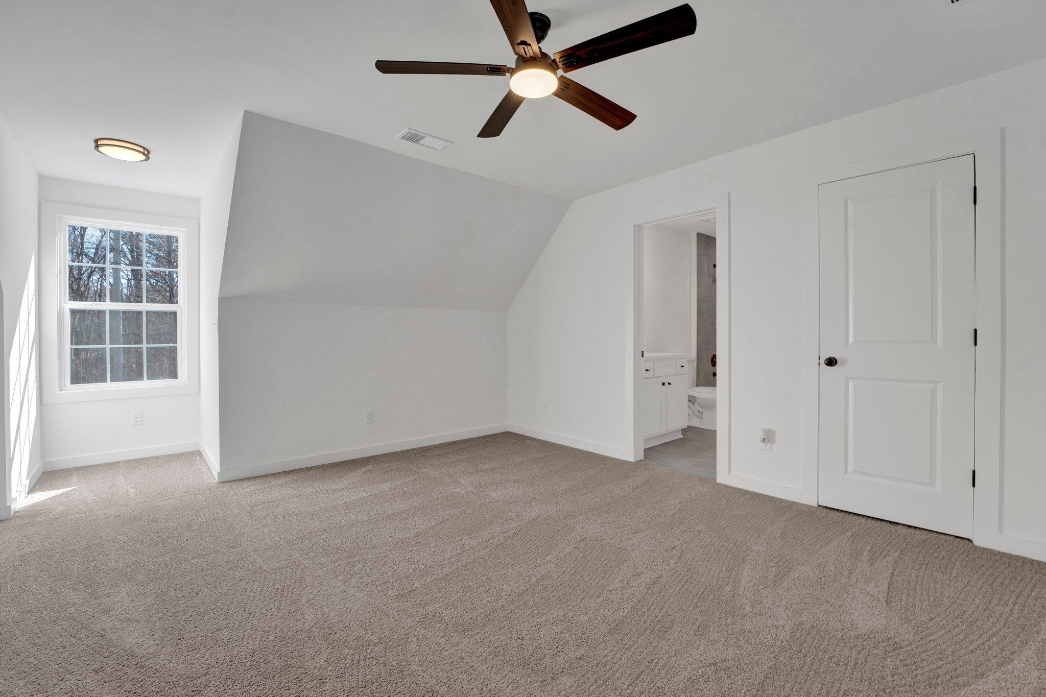 5702 Spring Lake Road Memphis, TN 38135 - Photo 23 of 38 an empty room with chandelier fan