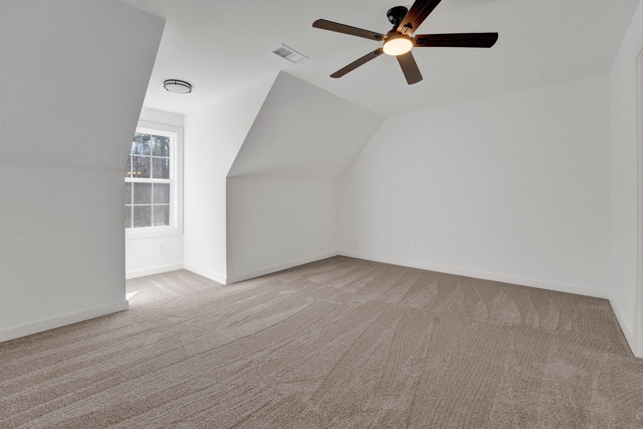 5702 Spring Lake Road Memphis, TN 38135 - Photo 29 of 38 a view of an empty room with a window