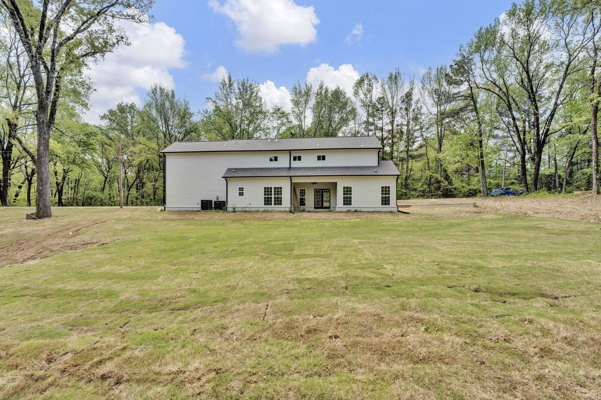 5702 Spring Lake Road Memphis, TN 38135 - Photo 35 of 38 a house view with a swimming pool