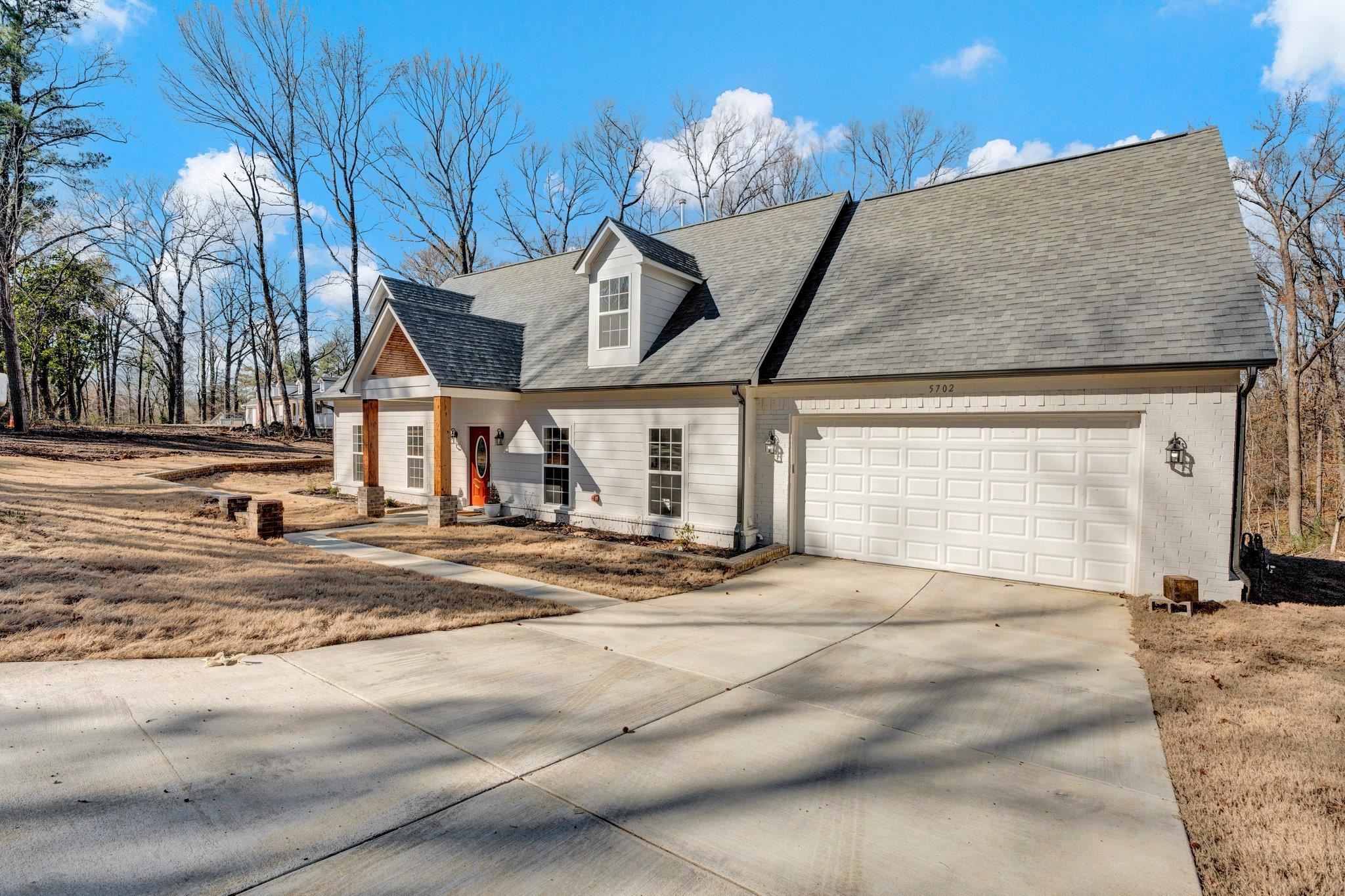5702 Spring Lake Road Memphis, TN 38135 - Photo 4 of 38 a view of a house with a outdoor space