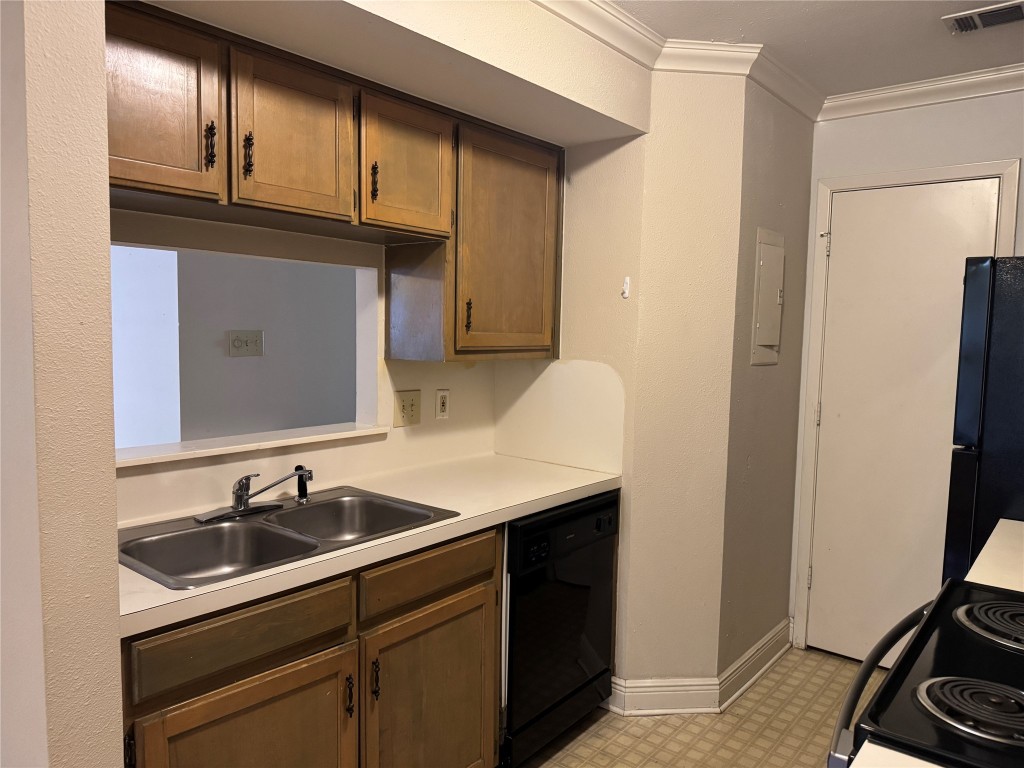 2907 Pearl Street, Unit 103 Austin, TX 78705 - Photo 5 of 20 a bathroom with a sink and a mirror