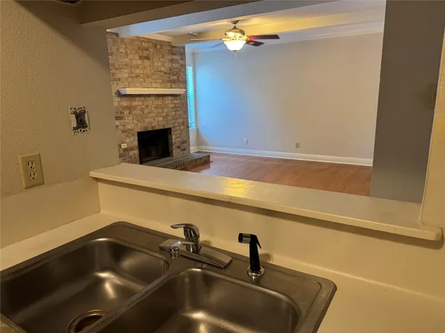 a bathroom with a sink and bathtub
