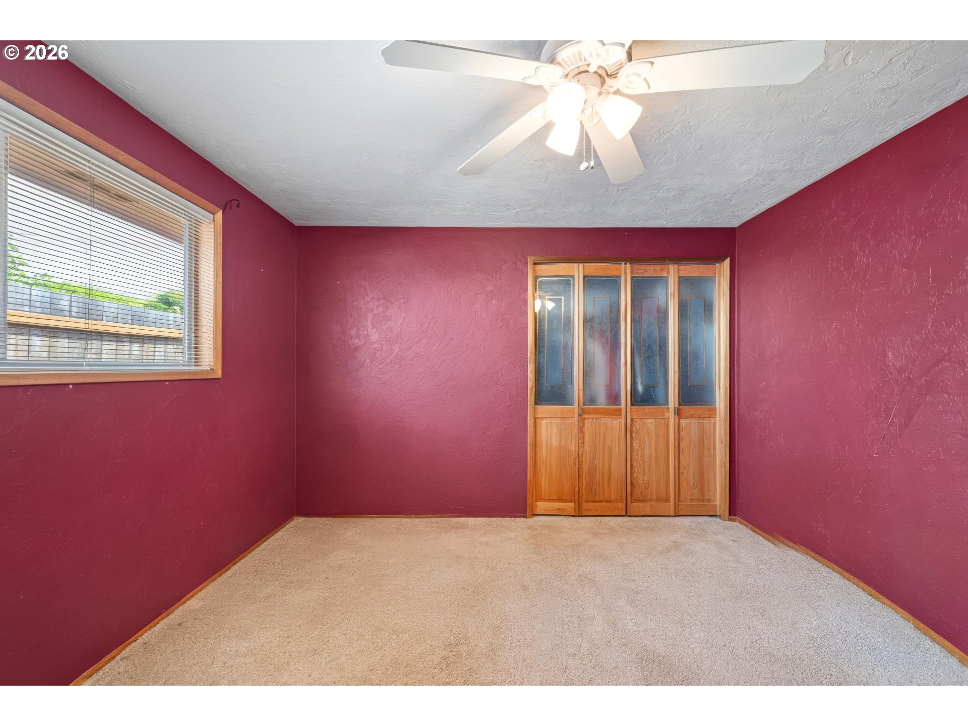 2465 17th Street Springfield, OR 97477 - Photo 27 of 47 a big room with chandelier fan and windows