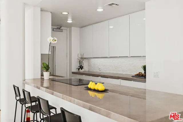 a view of a living room and a window