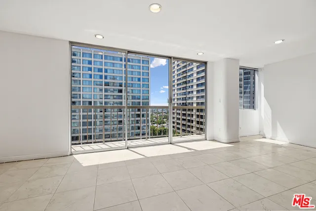 a view of a city with tall buildings