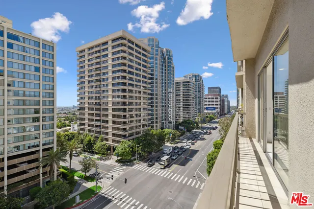 a view of balcony with a potted plant
