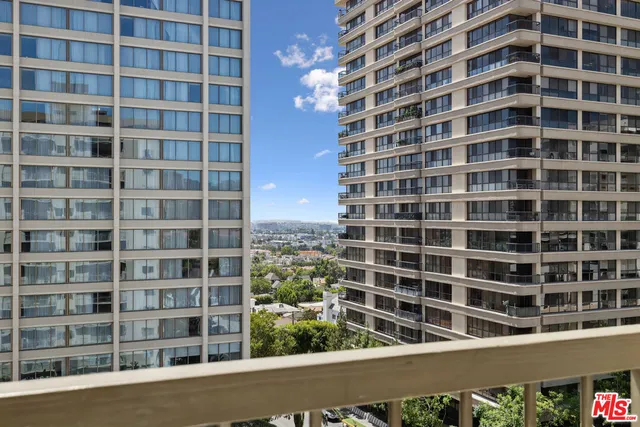 a view of a city with tall buildings