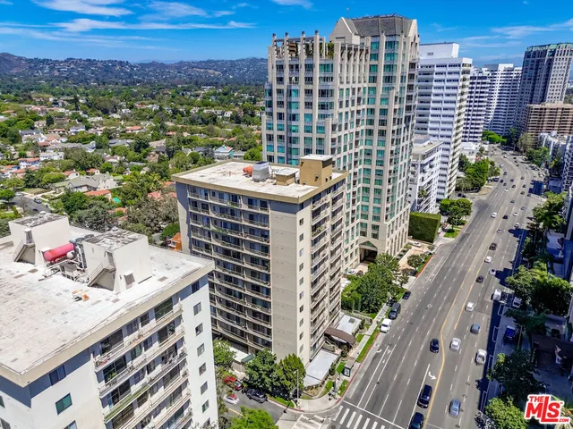 a view of a city with tall buildings