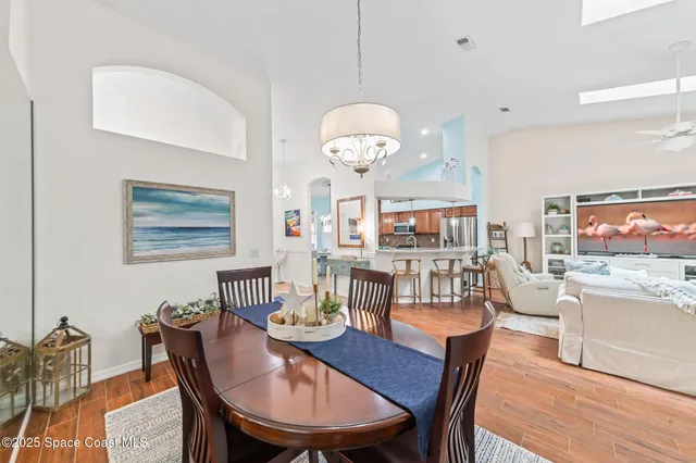 a front view of a house with a garden and porch