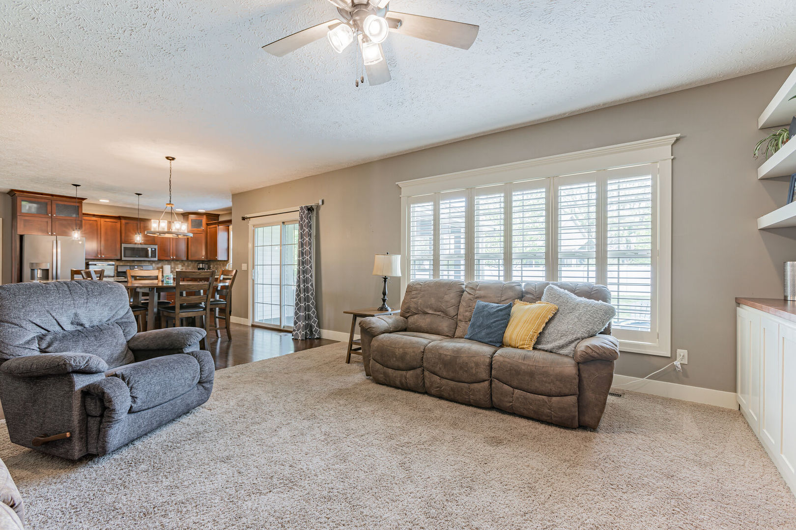 5 Fletcher Court Savoy, IL 61874 - Photo 12 of 48 a living room with furniture and a large window