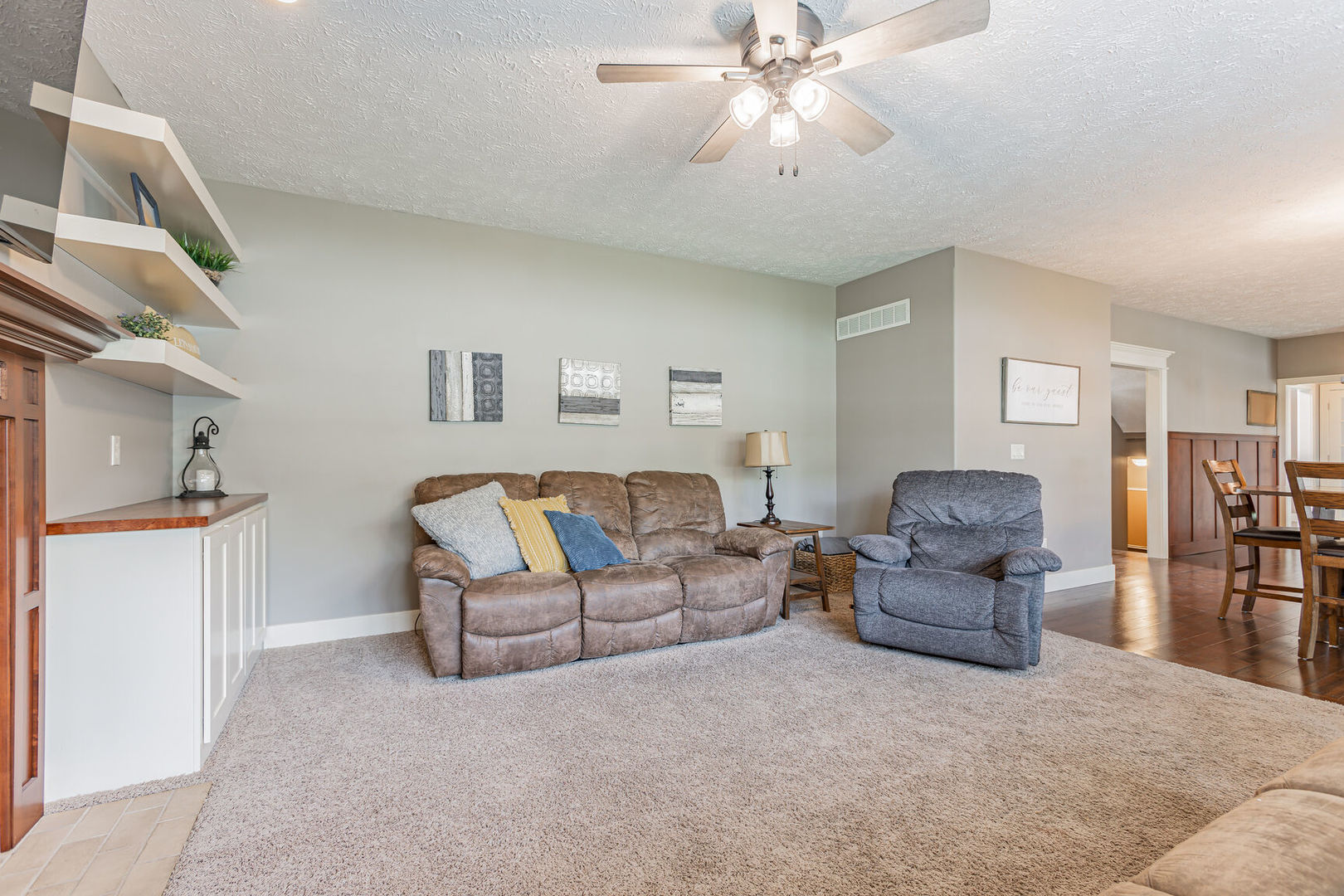 5 Fletcher Court Savoy, IL 61874 - Photo 13 of 48 a living room with furniture and a chandelier