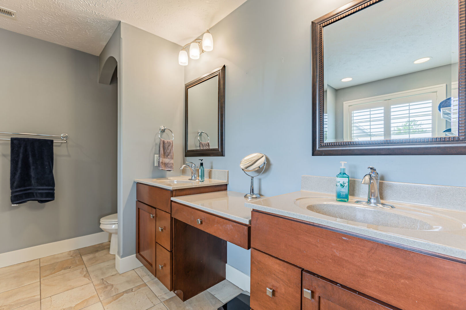 5 Fletcher Court Savoy, IL 61874 - Photo 25 of 48 a bathroom with a sink and a mirror