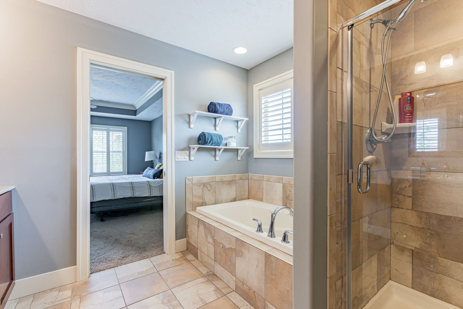 5 Fletcher Court Savoy, IL 61874 - Photo 26 of 48 a bathroom with a tub shower and sink