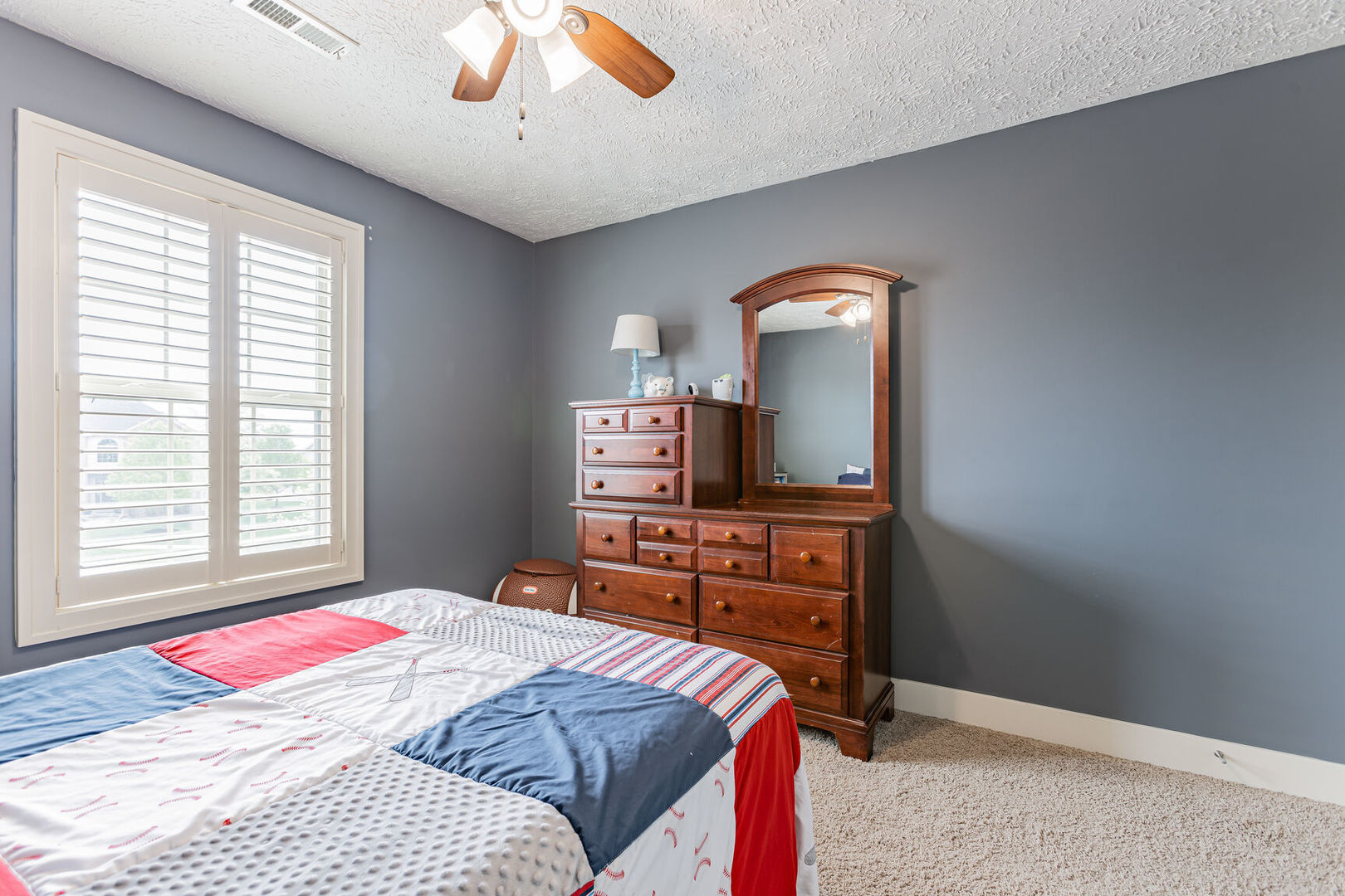 5 Fletcher Court Savoy, IL 61874 - Photo 28 of 48 a bedroom with a bed and a television