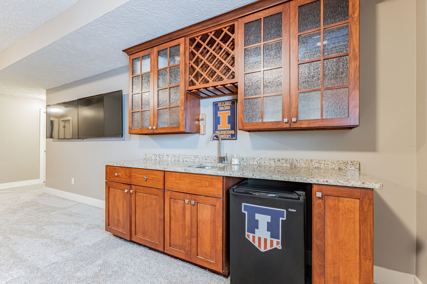 5 Fletcher Court Savoy, IL 61874 - Photo 37 of 48 a kitchen with stainless steel appliances granite countertop a stove and a sink