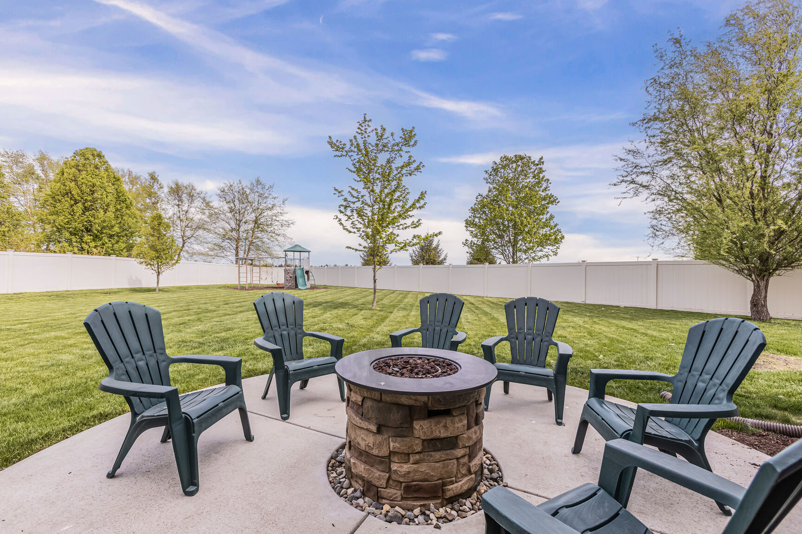 5 Fletcher Court Savoy, IL 61874 - Photo 42 of 48 a view of a chairs and table in patio