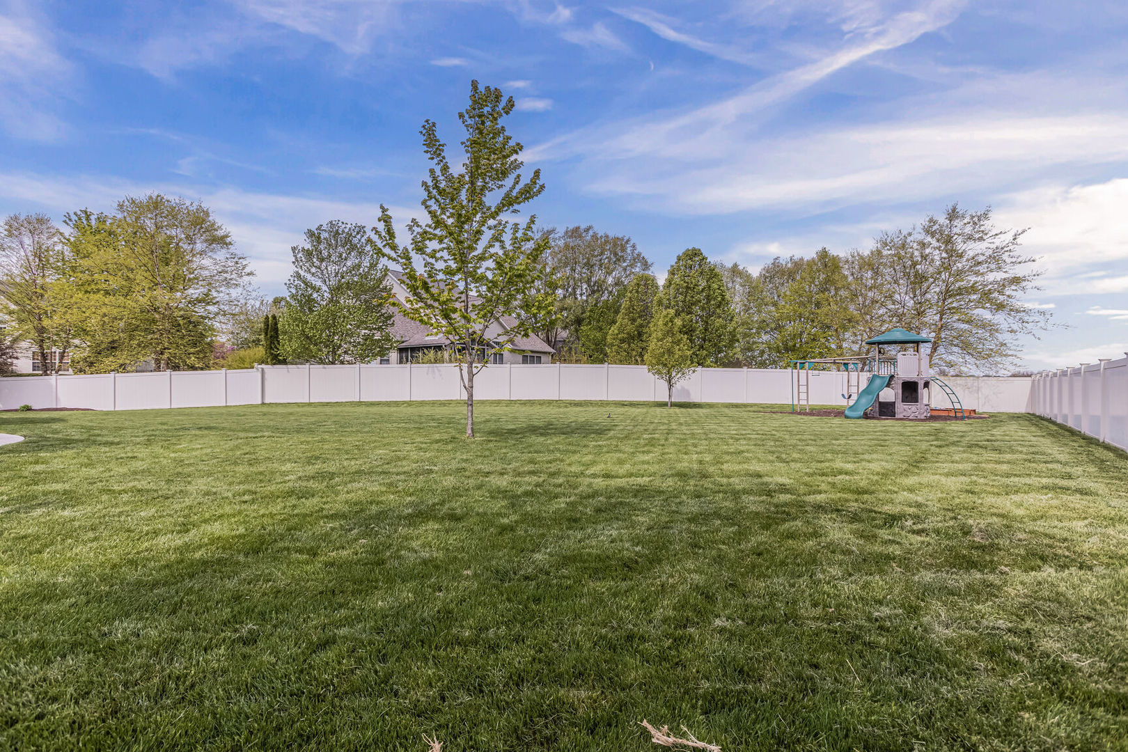 5 Fletcher Court Savoy, IL 61874 - Photo 45 of 48 a view of outdoor space with deck and yard