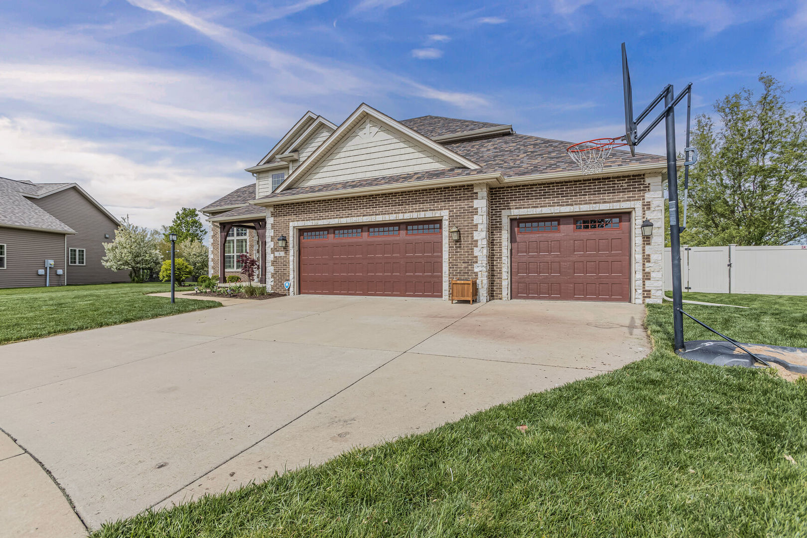 5 Fletcher Court Savoy, IL 61874 - Photo 46 of 48 a front view of a house with a yard and garage