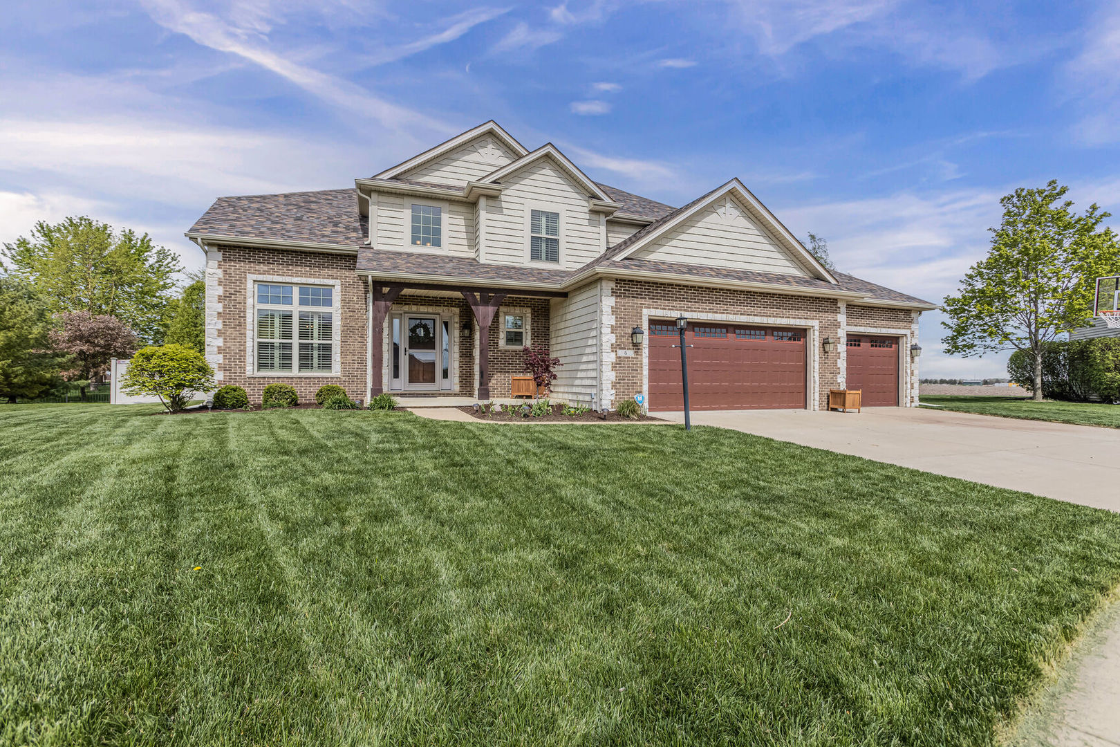 5 Fletcher Court Savoy, IL 61874 - Photo 47 of 48 a front view of a house with yard and green space