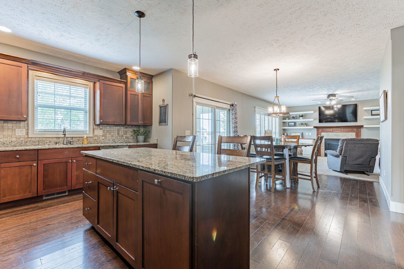 5 Fletcher Court Savoy, IL 61874 - Photo 6 of 48 a kitchen with lots of counter space and dining table