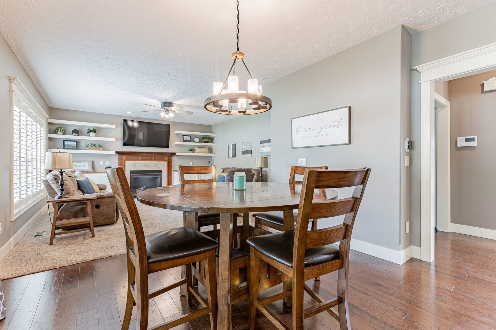 5 Fletcher Court Savoy, IL 61874 - Photo 9 of 48 a view of a dining room with furniture wooden floor and chandelier