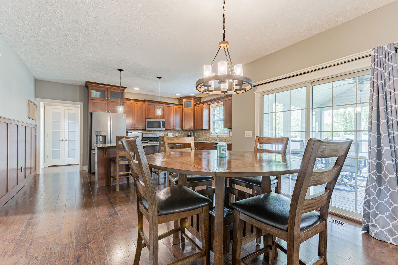 5 Fletcher Court Savoy, IL 61874 - Photo 10 of 48 a view of a dining room with furniture window and wooden floor