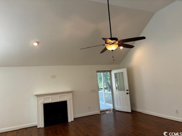 2477 Pleasant Grove Road Loris, SC 29569 - Photo 5 of 25 Unfurnished living room with dark wood-style floors, high vaulted ceiling, a fireplace, and ceiling fan