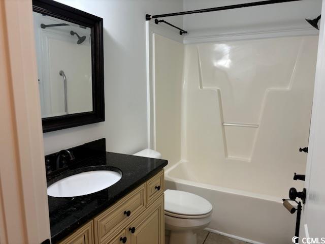 2477 Pleasant Grove Road Loris, SC 29569 - Photo 10 of 25 Full bathroom featuring vanity, shower / bath combination, and light tile patterned floors